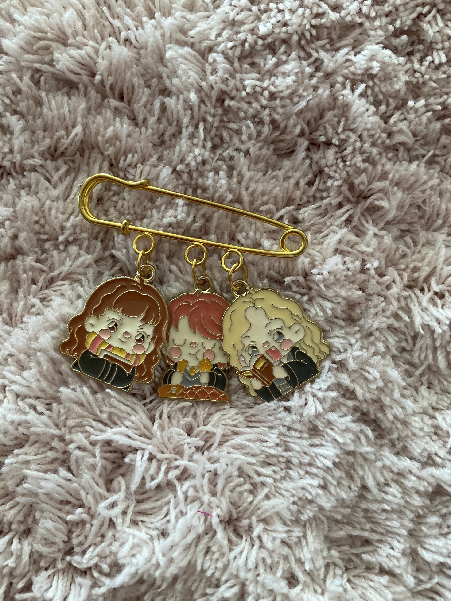 Broche H.P - 7