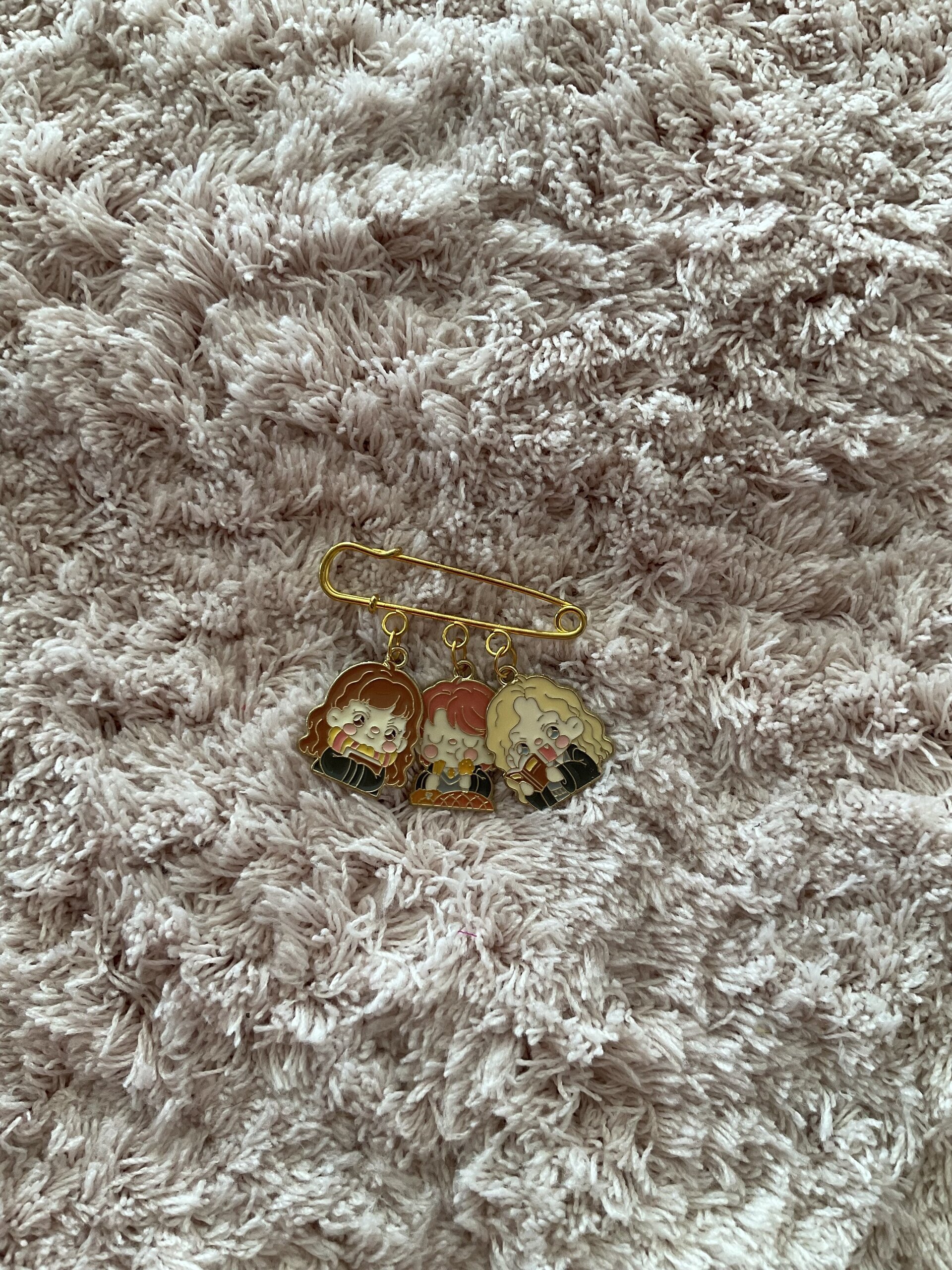 Broche H.P - 1