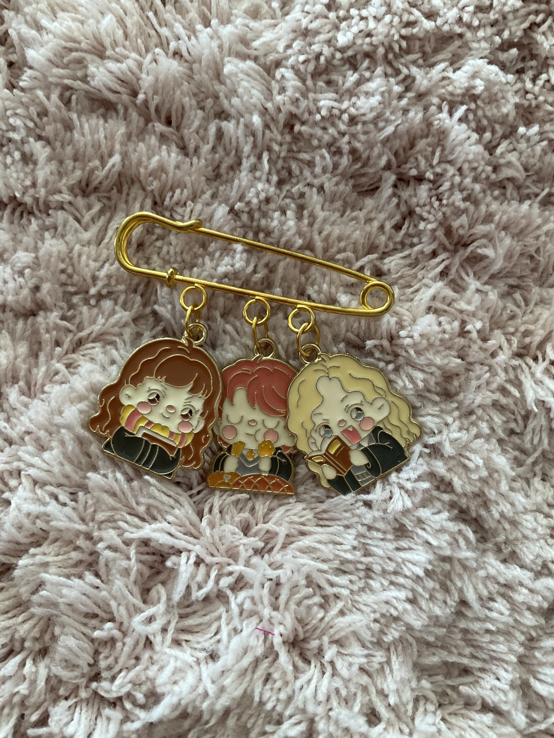 Broche H.P - 4