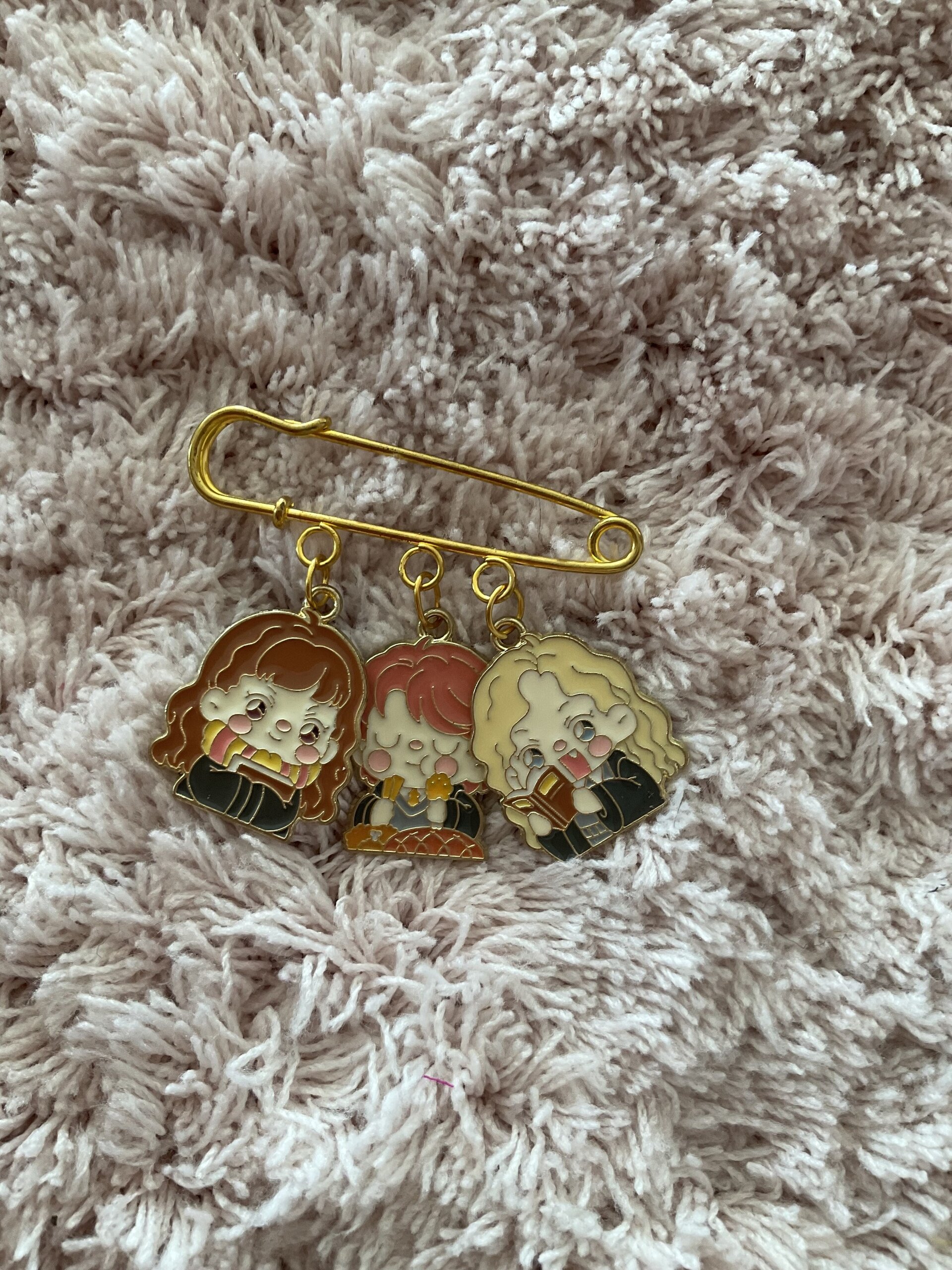 Broche H.P - 9