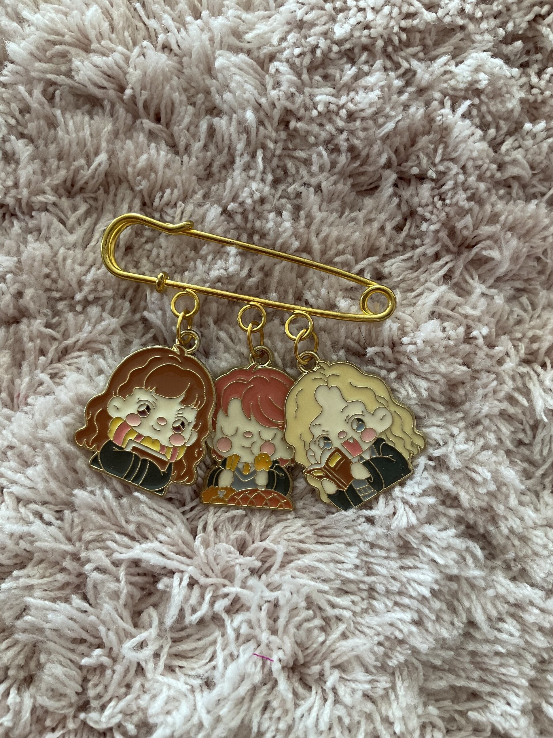Broche H.P - 6